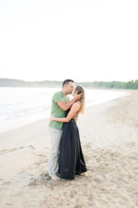 couple kissing on Hanalei Beach
