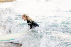 Oahu Hawaii surfer crashing wave