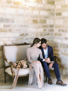 bride and groom at Sunstone Winery vintage couch