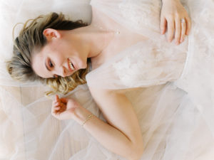bride laying in Anchorage Museum