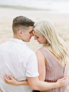 Oahu engagement photos on the beach pink dress
