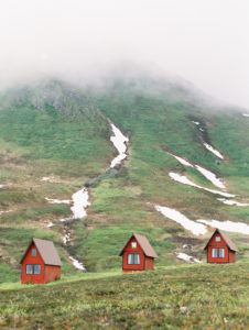 red A-frame cabins in Hatcher Pass